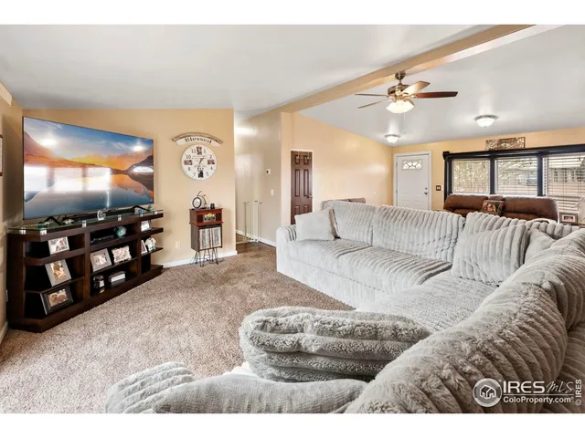 a bathroom with a sink a toilet a mirror and vanity