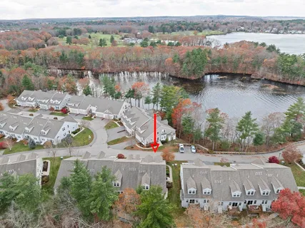 an aerial view of houses with outdoor space