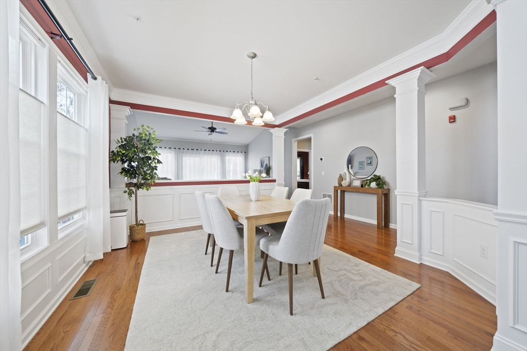 33 Kelly Way, Unit 33 Canton, MA 02021 - Photo 10 of 42 a view of a dining room with furniture window and wooden floor