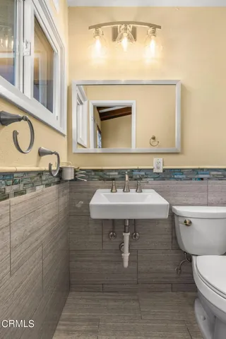 a bathroom with a sink and a toilet