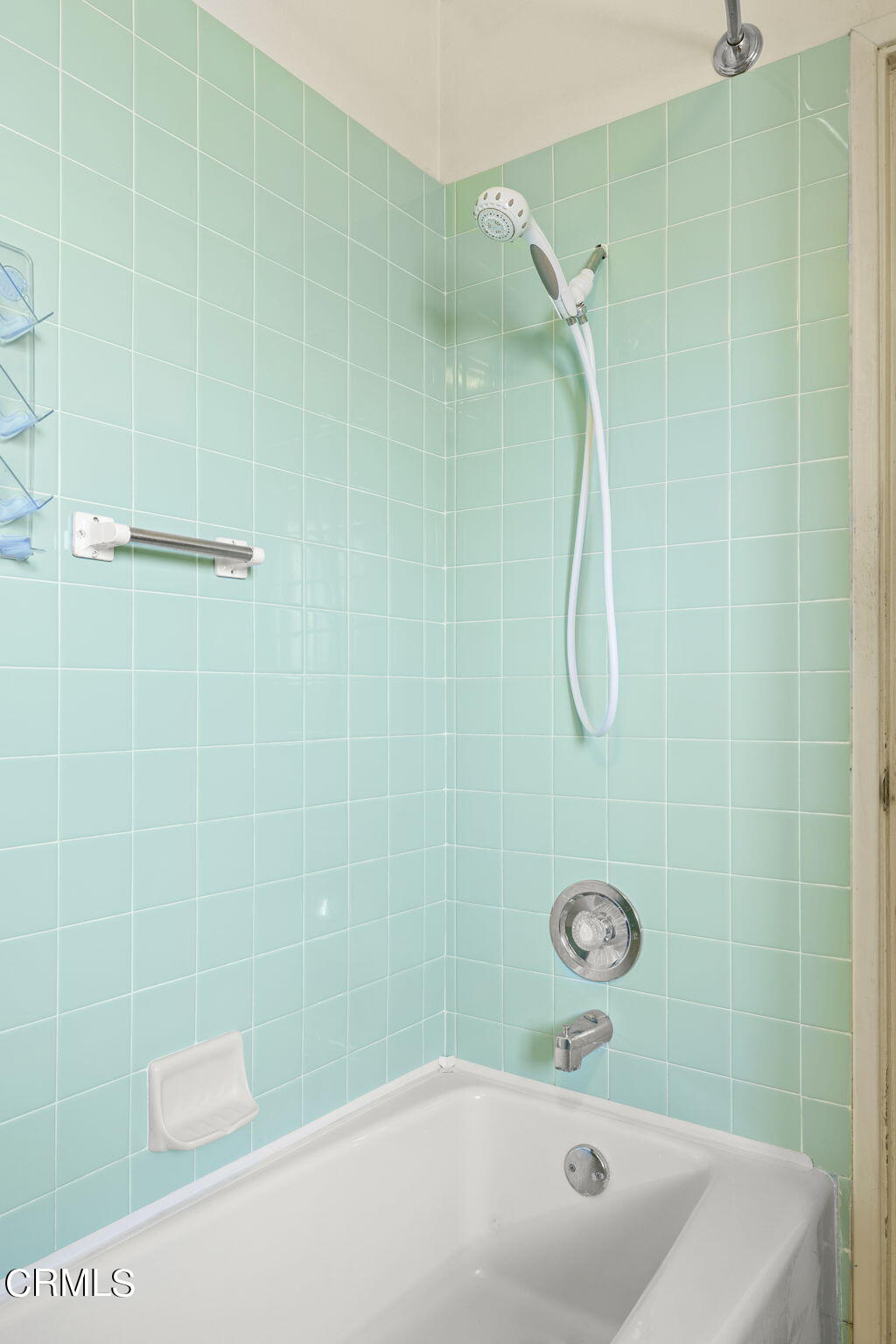 3131 Armada Drive Ventura, CA 93003 - Photo 24 of 31 a bathroom with a bath tub with a shower
