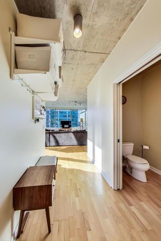 a view of a living room and bathroom