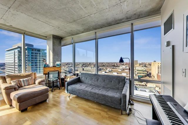 a living room with couches and a coffee table