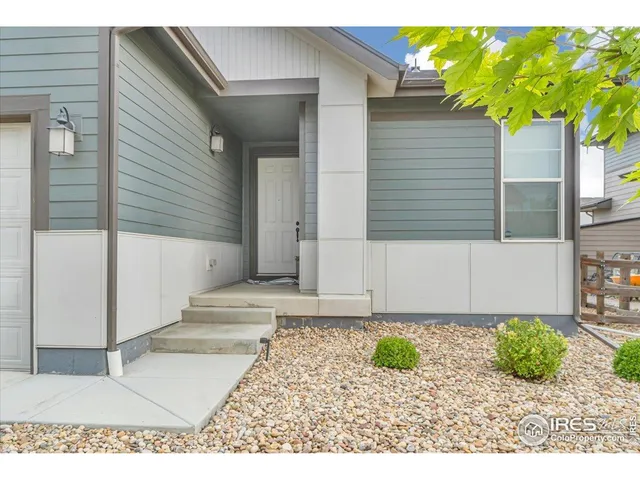 a open kitchen with kitchen island a sink stainless steel appliances and cabinets