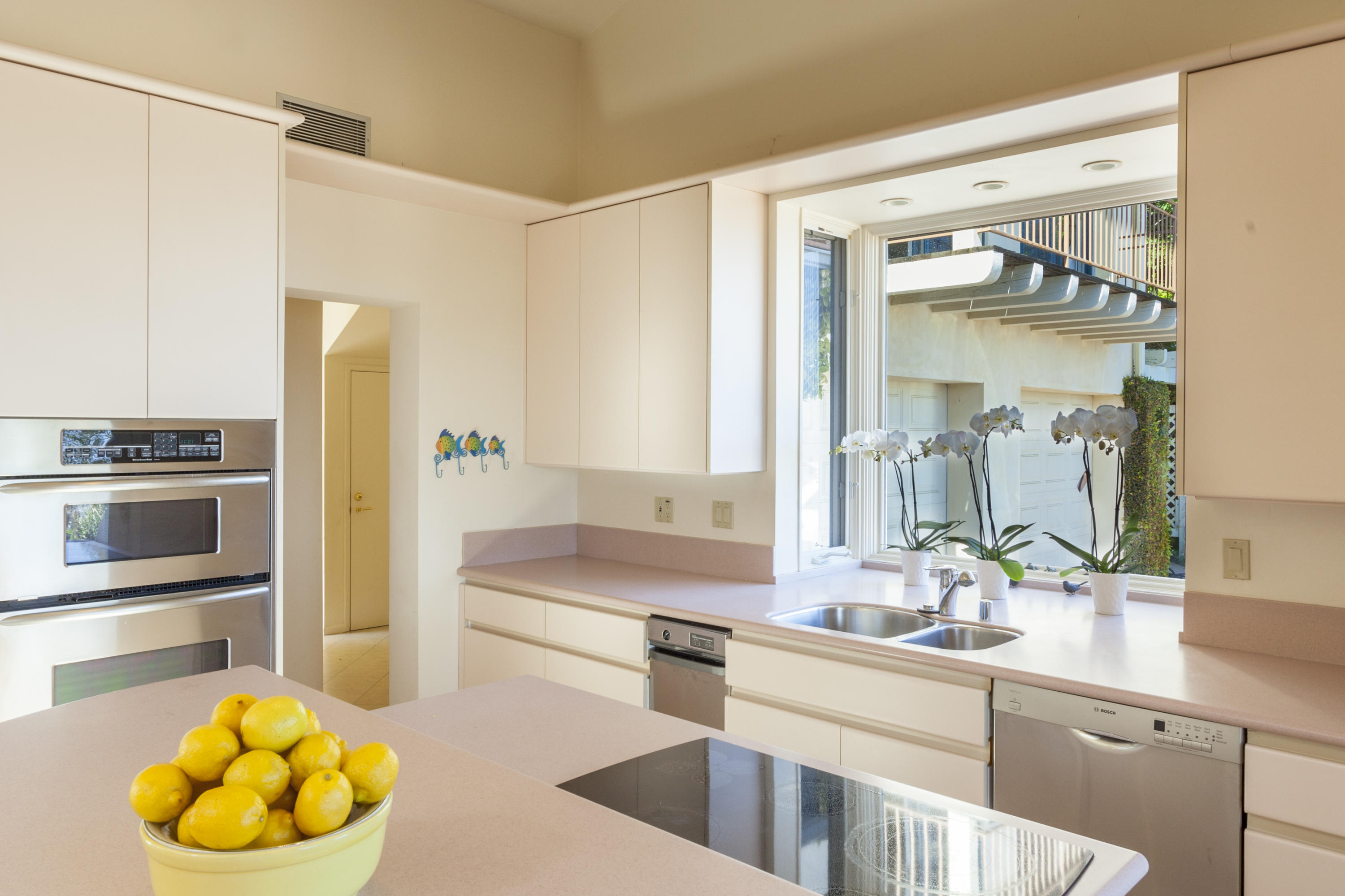 1568 Franceschi Road Santa Barbara, CA 93103 - Photo 3 of 16 a view of a kitchen with a sink and refrigerator