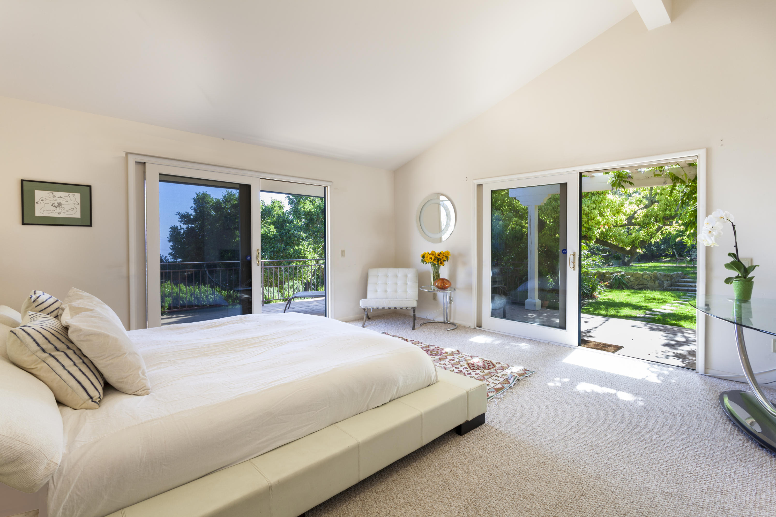 1568 Franceschi Road Santa Barbara, CA 93103 - Photo 5 of 16 a bedroom with a bed and a large window with outer view