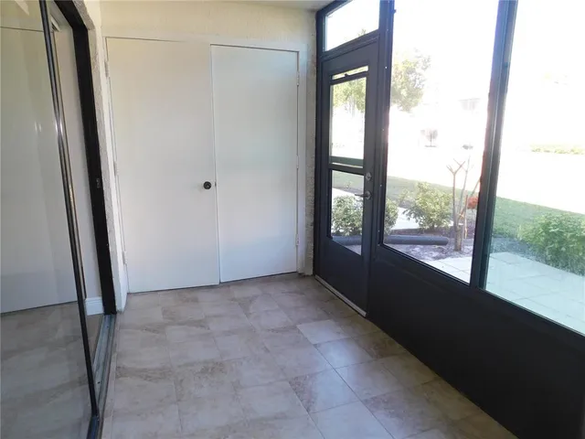 a view of an empty room and window