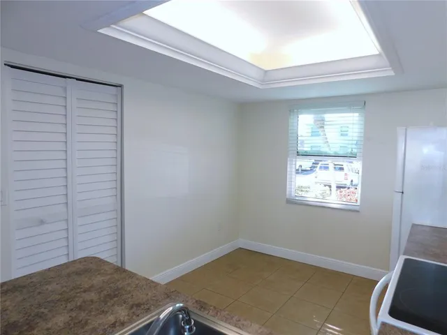 a view of a room that has a window in it