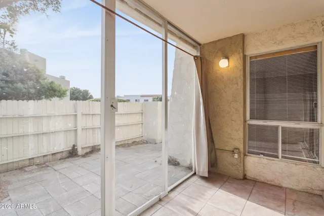 a view of a bathroom with a glass door