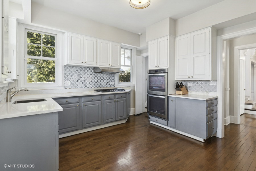 160 Sheridan Road Glencoe, IL 60093 - Photo 15 of 46 a kitchen with a refrigerator sink and cabinets