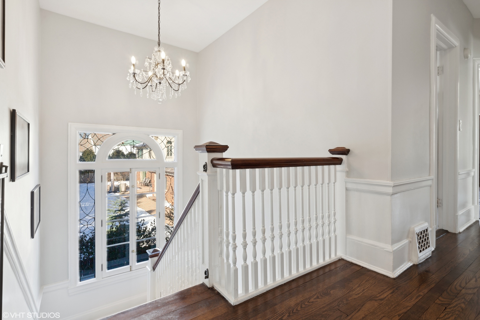 160 Sheridan Road Glencoe, IL 60093 - Photo 25 of 46 a view of a bedroom with wooden floor and door