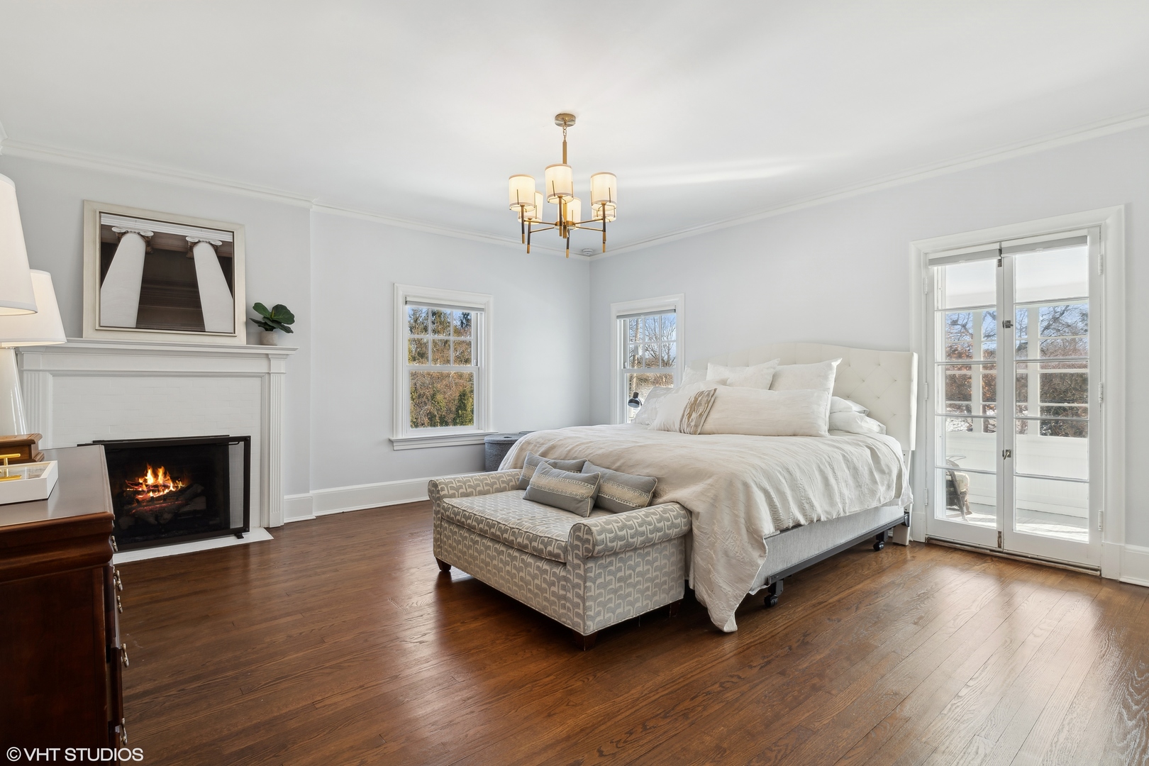 160 Sheridan Road Glencoe, IL 60093 - Photo 26 of 46 a spacious bedroom with a bed and a fireplace