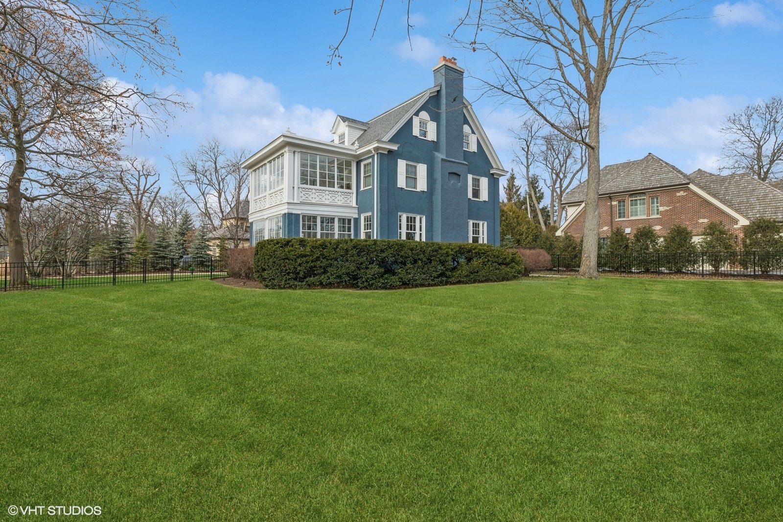 160 Sheridan Road Glencoe, IL 60093 - Photo 40 of 46 a front view of a house with a yard