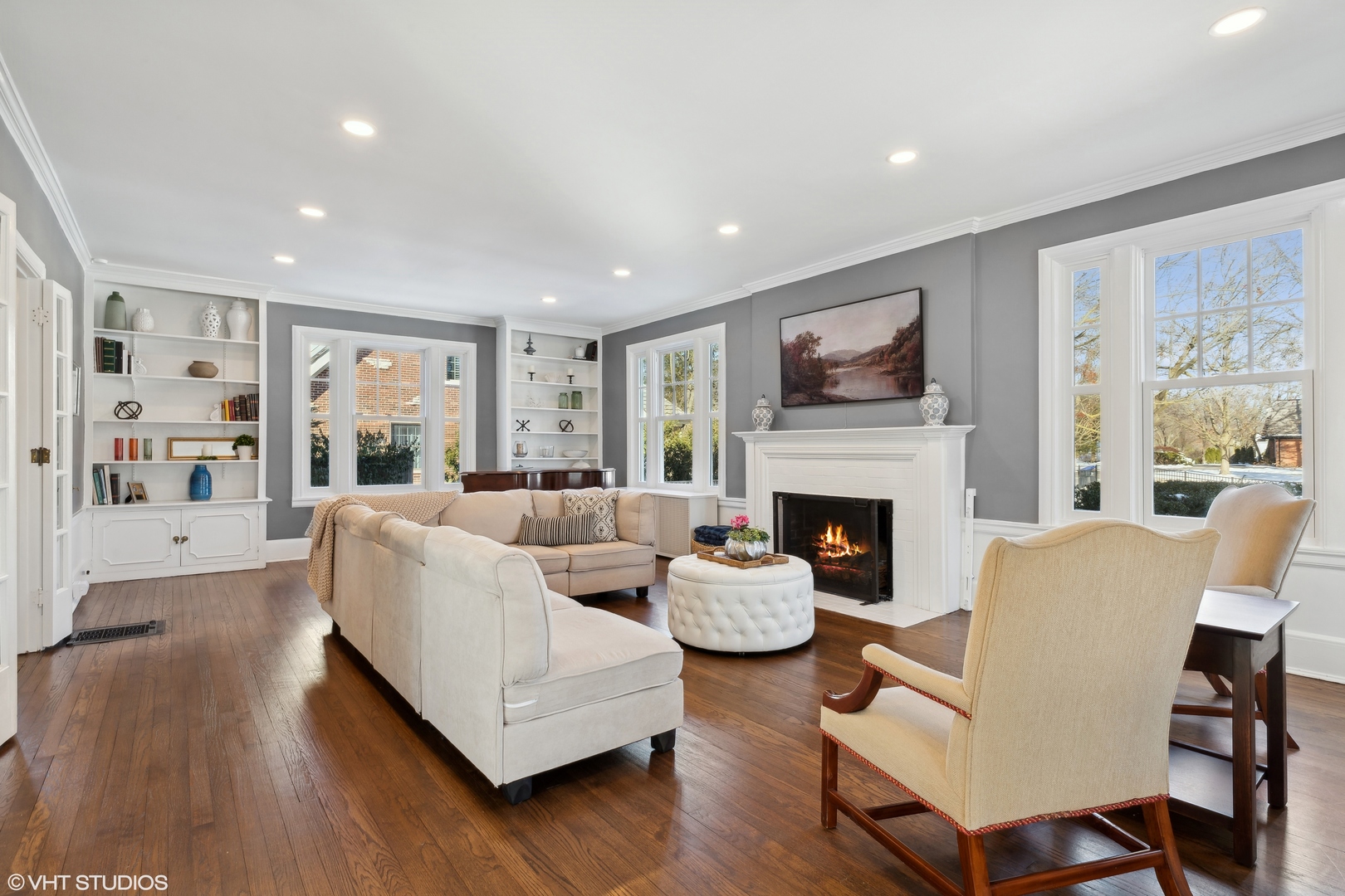 160 Sheridan Road Glencoe, IL 60093 - Photo 10 of 46 a living room with fireplace furniture and a large window