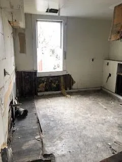 a picture of a bathroom with a shower