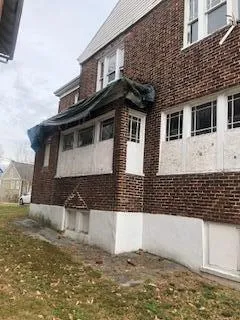 a front view of a house with windows