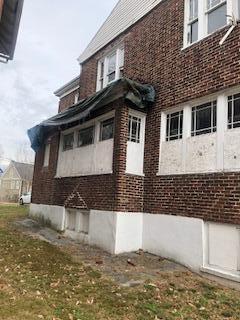 845 Day Avenue Southwest Roanoke, VA 24016 - Photo 4 of 26 a front view of a house with windows