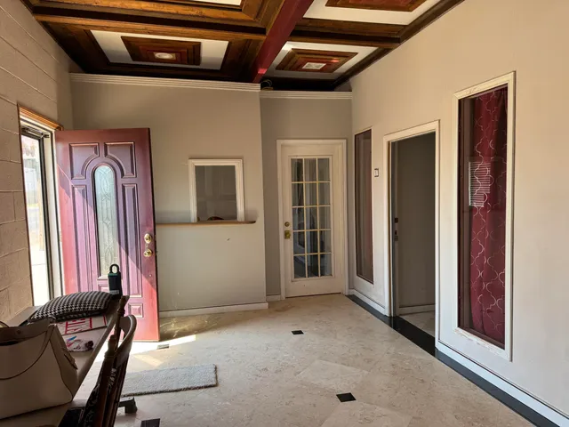 a view of an entryway with staircase