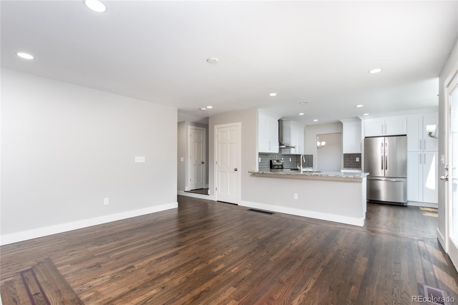 2505 Spring Hill Court Highlands Ranch, CO 80129 - Photo 8 of 40 a view of kitchen and wooden floor