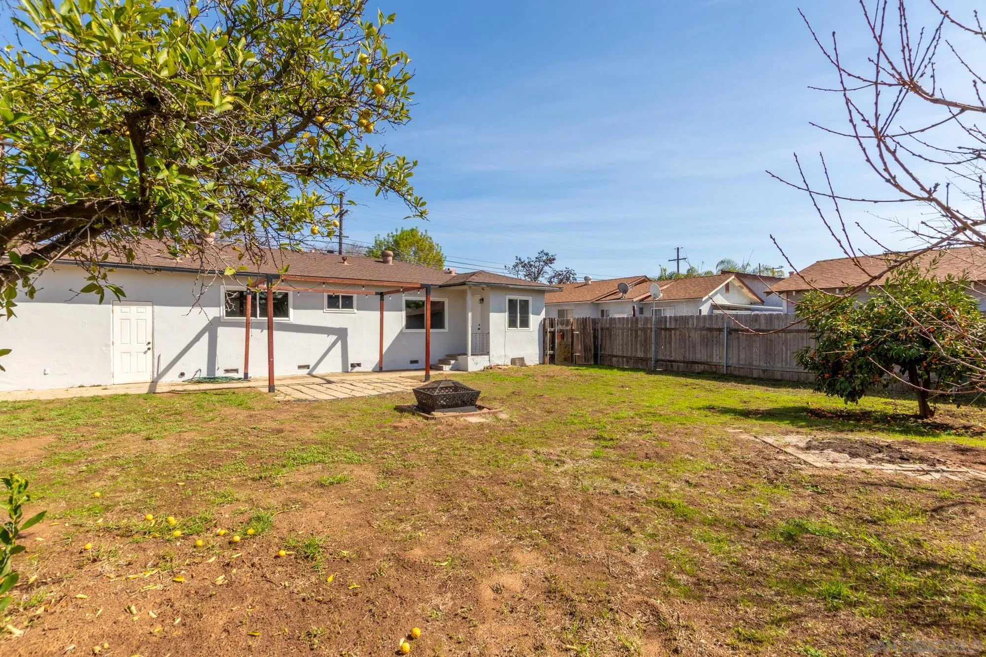 909 North Midway Drive Escondido, CA 92027 - Photo 18 of 19 a front view of a house with a yard