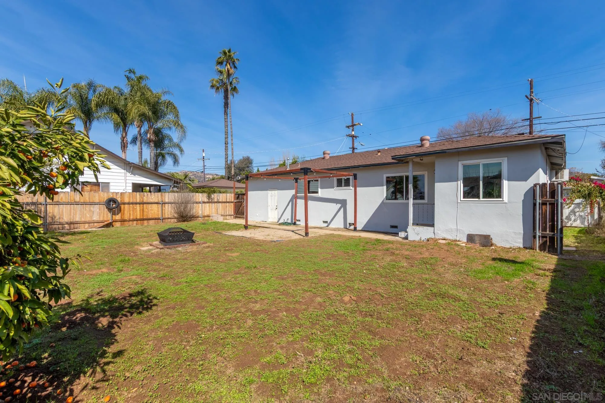 909 North Midway Drive Escondido, CA 92027 - Photo 19 of 19 a view of a house with pool and sitting area