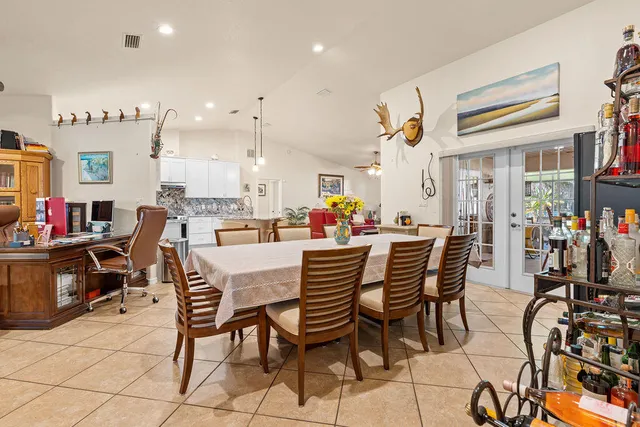 a kitchen with stainless steel appliances white cabinets and a sink