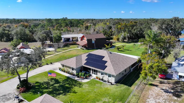 an aerial view of a house with a garden