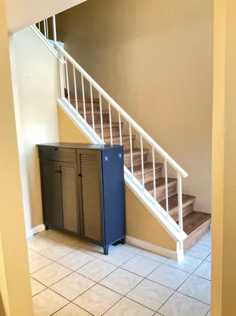 a view of front door and wooden building
