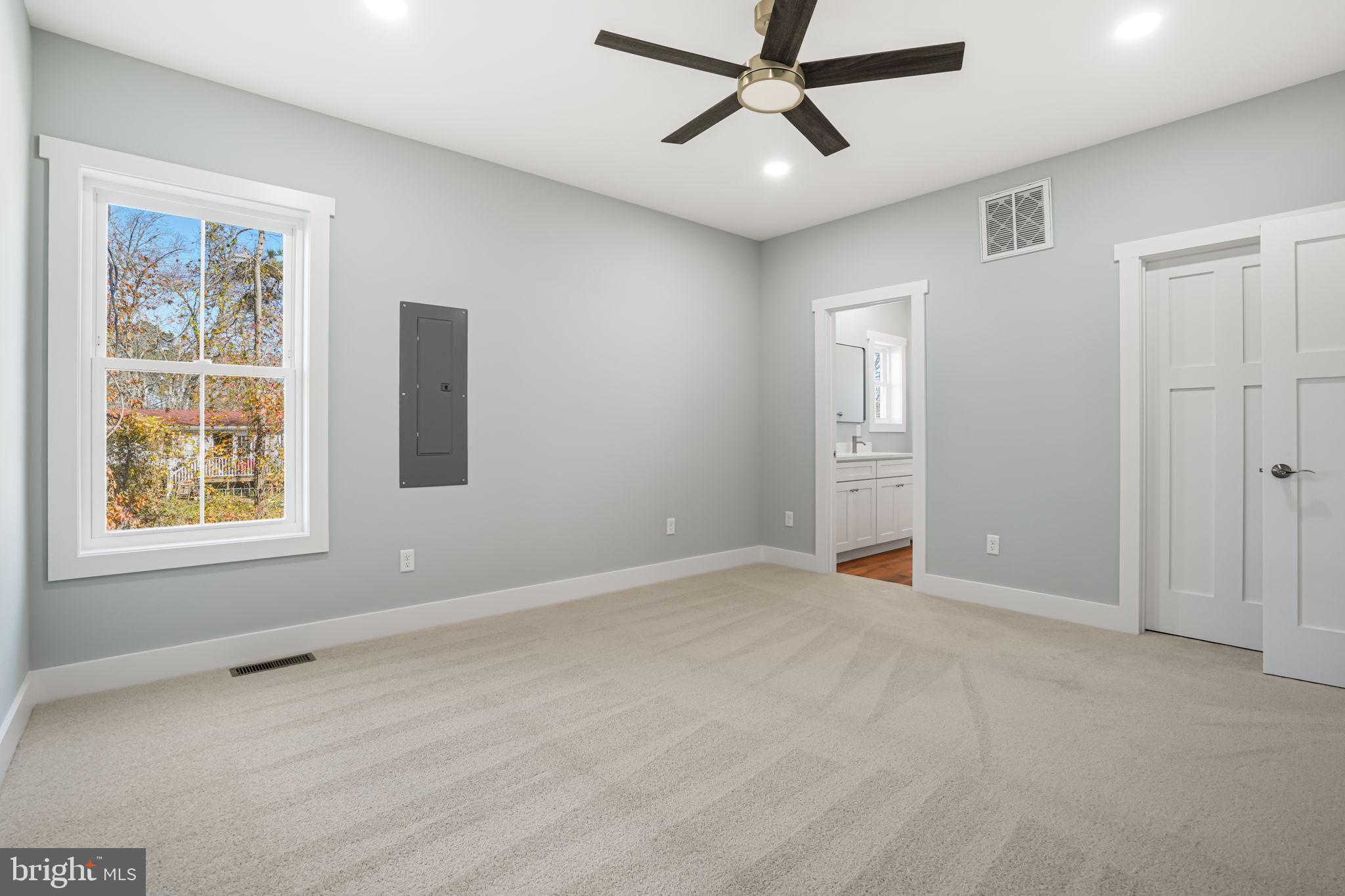 7921 East Side Road Chincoteague Island, VA 23336 - Photo 16 of 38 a view of an empty room with a window