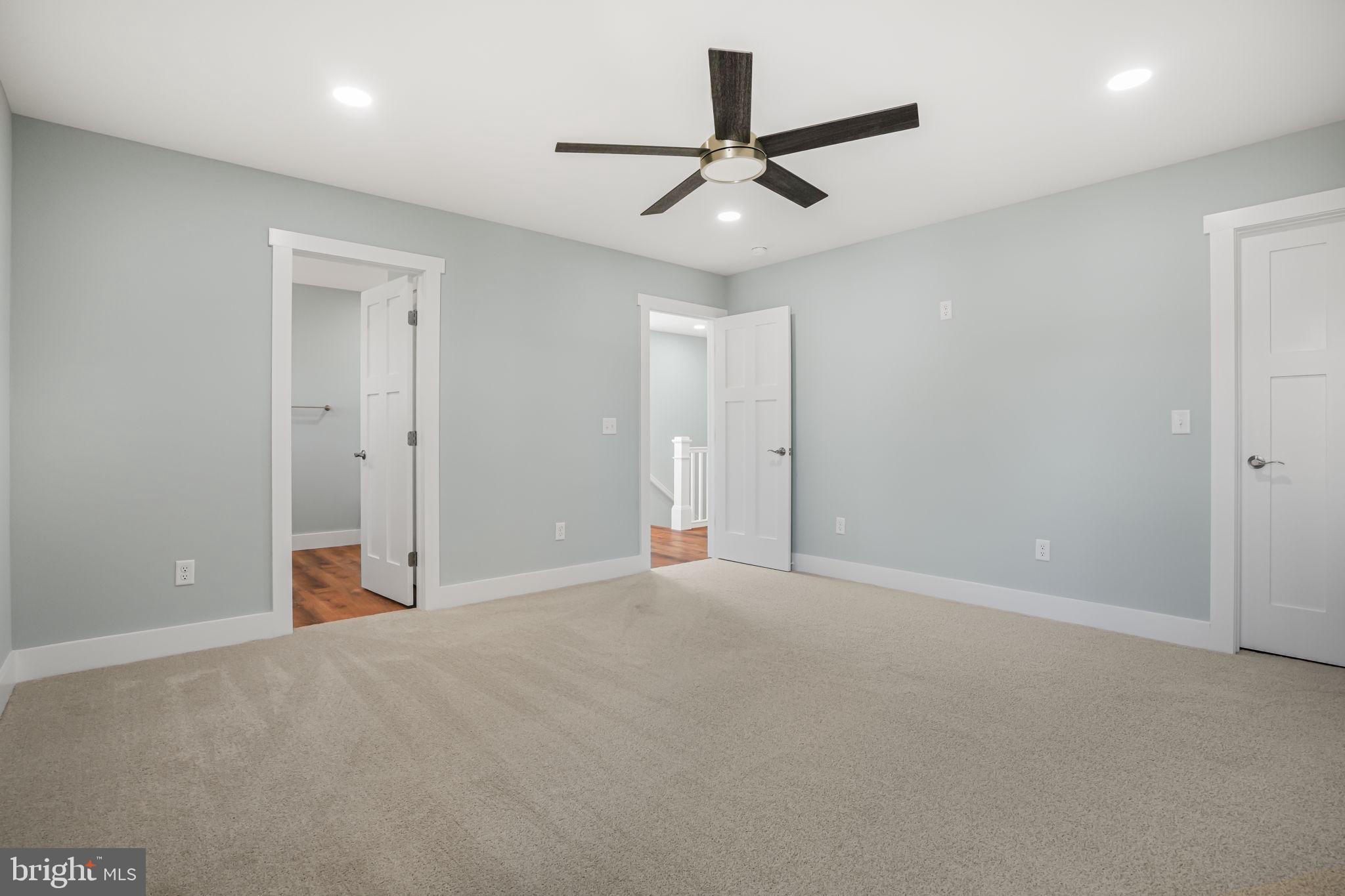7921 East Side Road Chincoteague Island, VA 23336 - Photo 23 of 38 a view of a livingroom with a ceiling fan and window