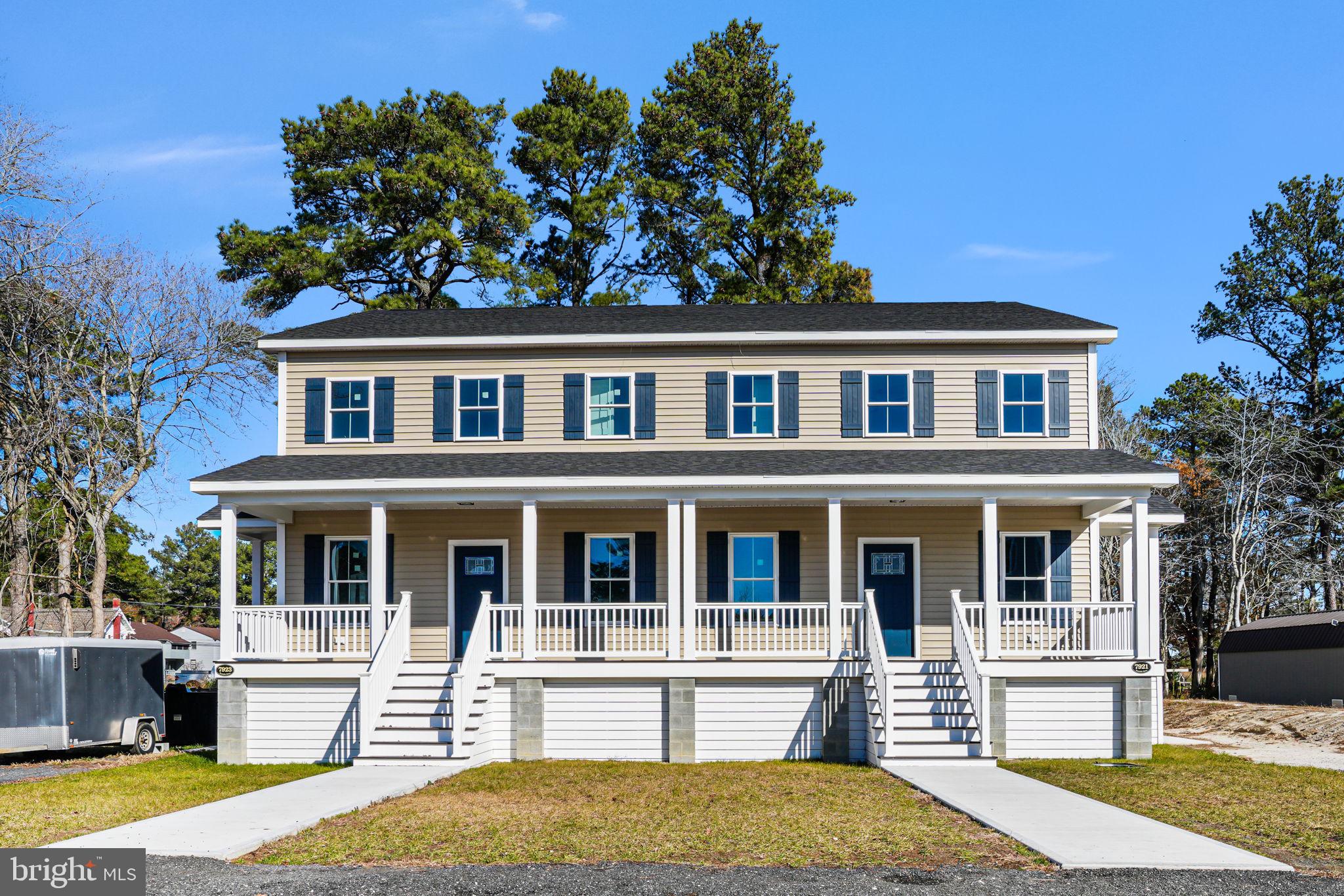 7921 East Side Road Chincoteague Island, VA 23336 - Photo 33 of 38 front view of a house with a yard