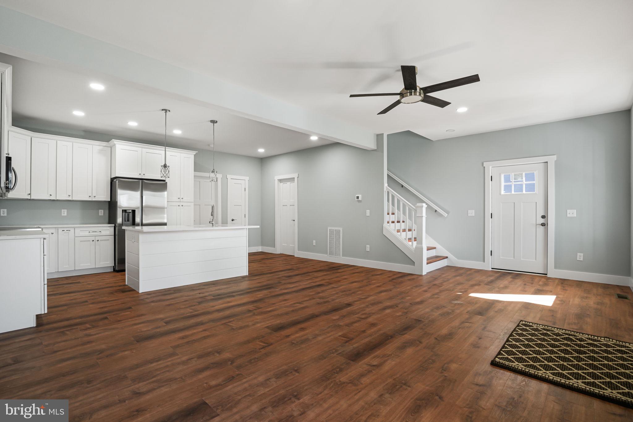 7921 East Side Road Chincoteague Island, VA 23336 - Photo 6 of 38 a view of kitchen with refrigerator microwave and stove