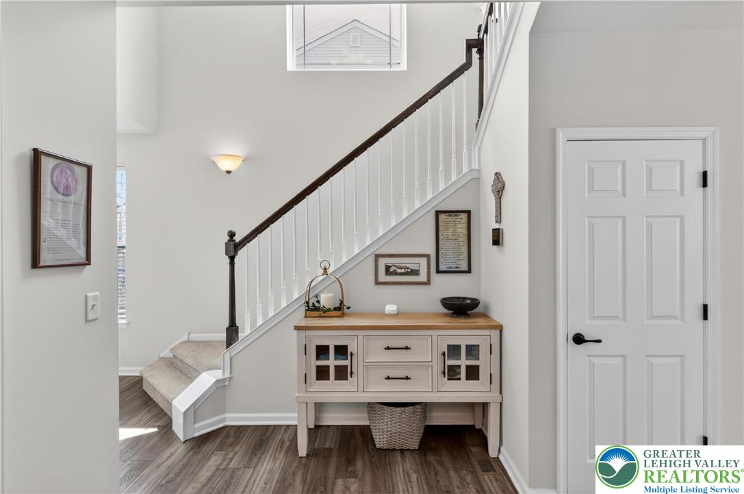 3973 Mink Road Emmaus, PA 18049 - Photo 23 of 45 a view of entryway with wooden floor and stairs
