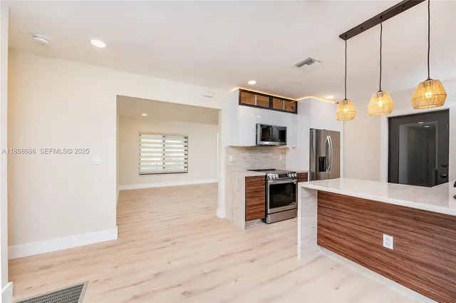 $950,000 | 625 Miller Drive, Miami Springs, FL 33166