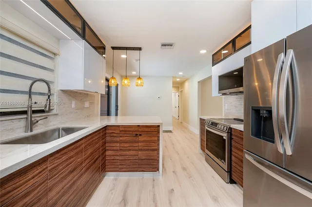 $950,000 | 625 Miller Drive, Miami Springs, FL 33166