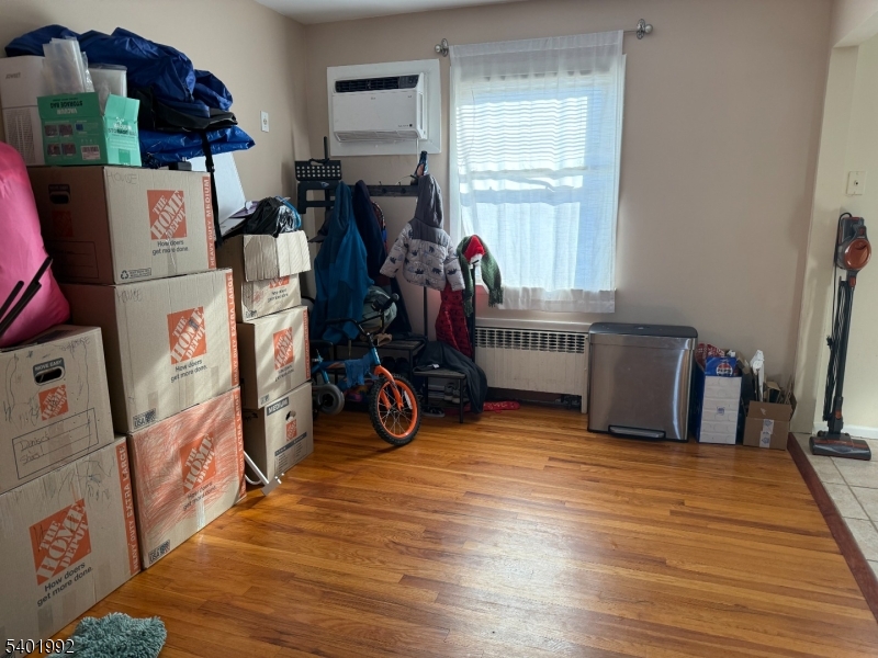 6 Underhill Court, Unit 2 Nutley, NJ 07110 - Photo 5 of 11 a view of a room with wooden floor and windows