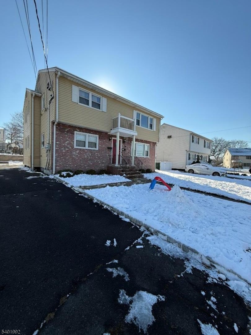 6 Underhill Court, Unit 2 Nutley, NJ 07110 - Photo 9 of 11 a house view with a seating space