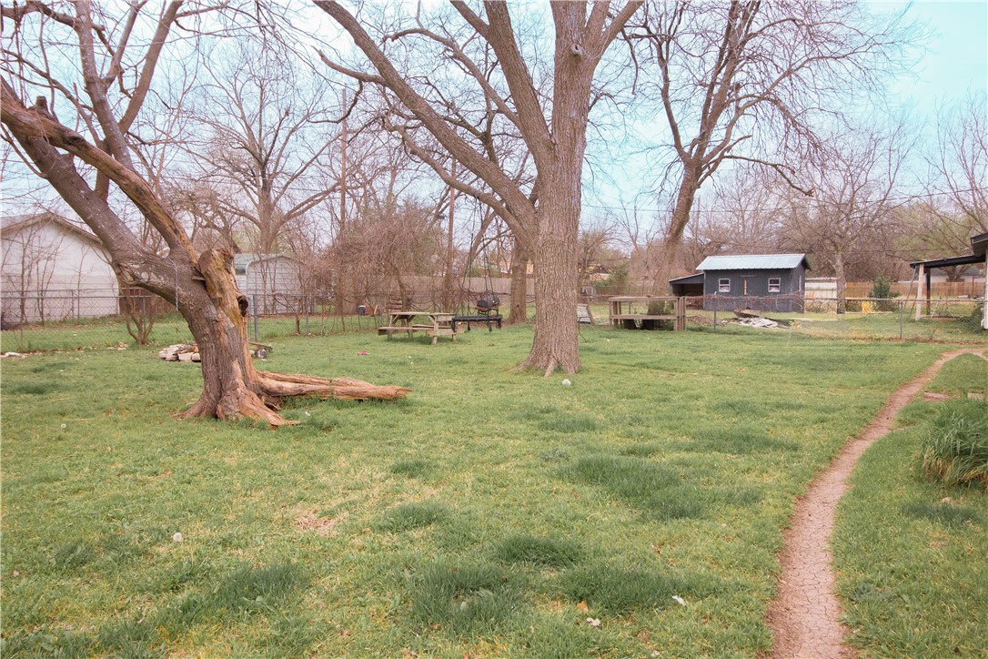 114 Brewster Street Waco, TX 76706 - Photo 16 of 16 a view of a garden with trees