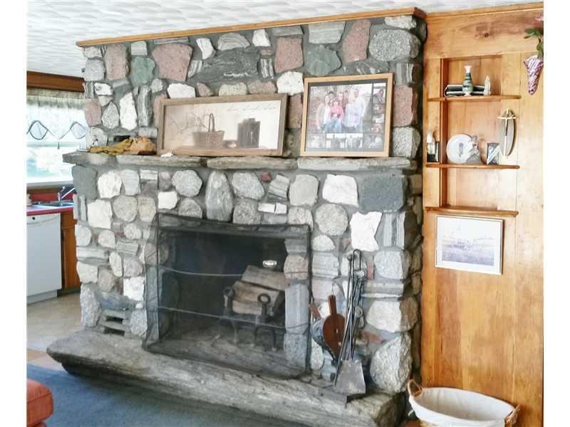 98 Leeman Arm Road Palermo, ME 04354 - Photo 12 of 28 Living Room. Stone Fireplace in...