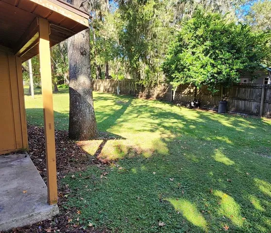 a view of a yard in front of house