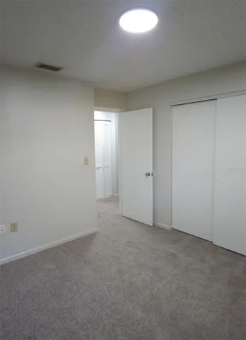 an empty room with an entryway