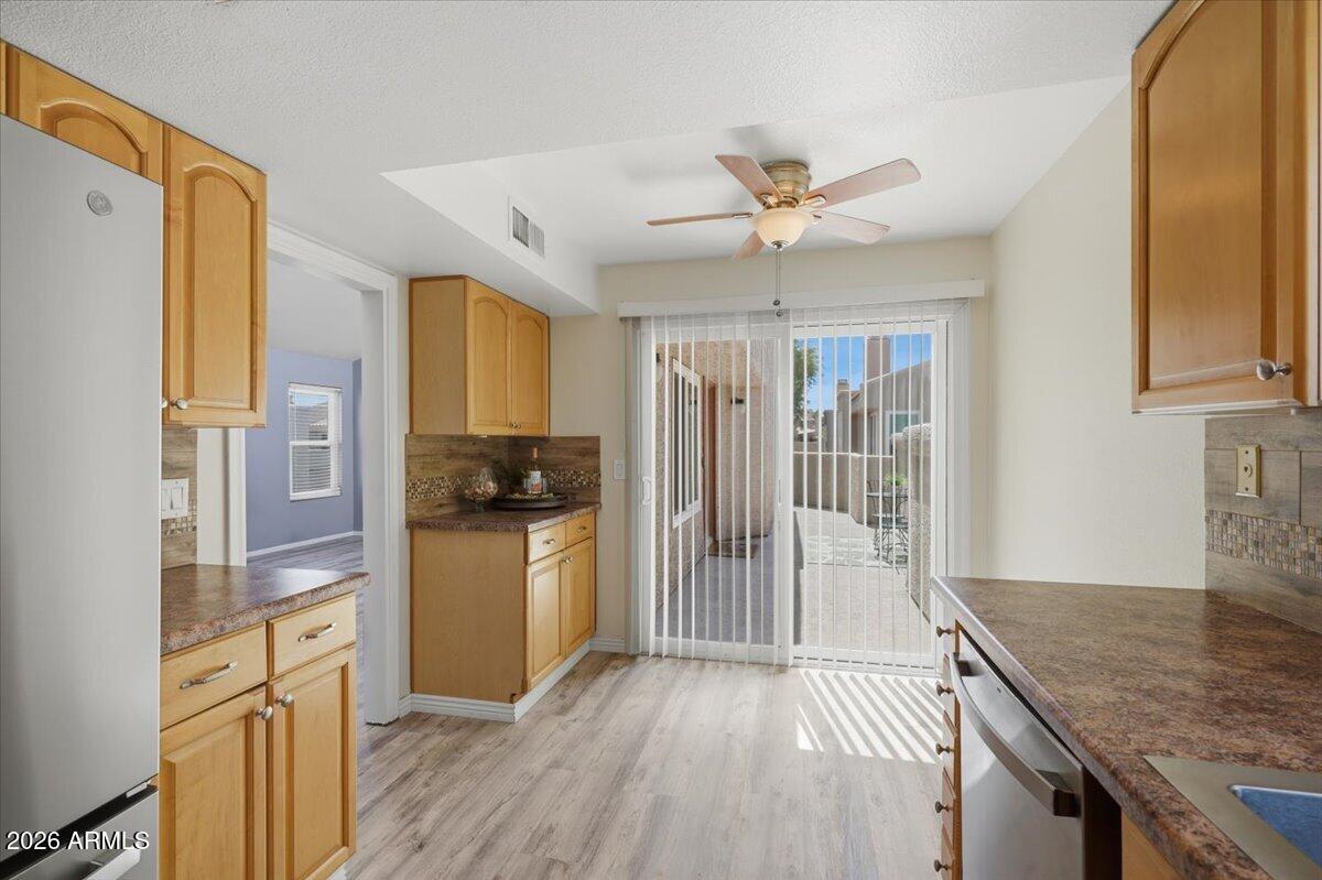 2834 South Ext Road, Unit 2010 Mesa, AZ 85210 - Photo 16 of 36 Kitchen Leads to Dining Area
