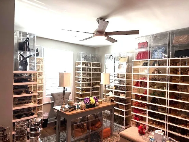 a view of an outdoor space with wooden floor and windows