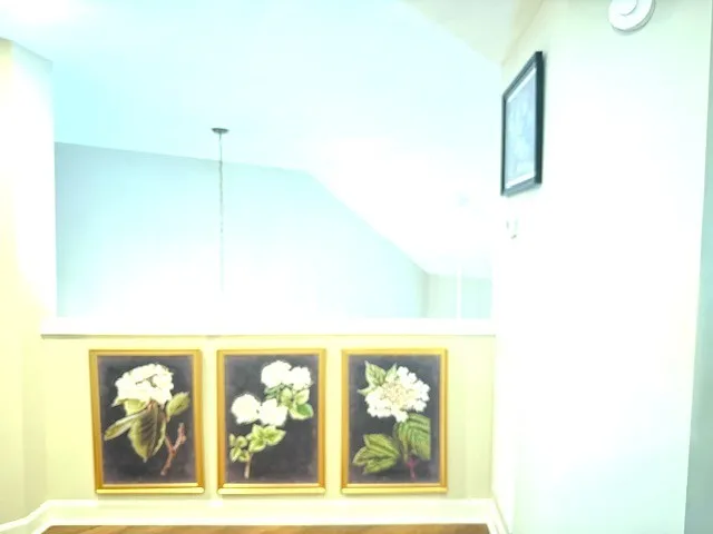 a picture of a wall with a painting on the wall