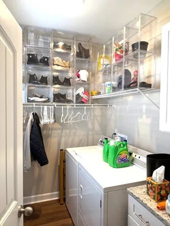 a kitchen with a refrigerator and a stove