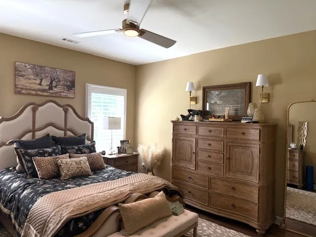 a bedroom with a bed and furniture