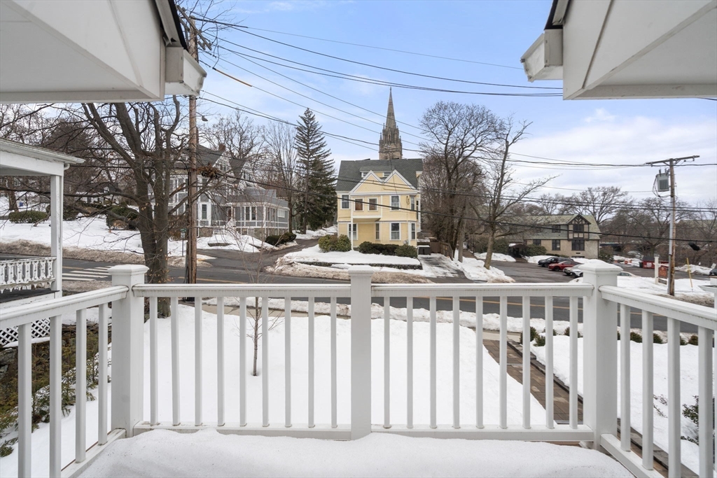 68 Chestnut Street, Unit 6 Newton, MA 02465 - Photo 18 of 22 a view of a house with a wooden fence