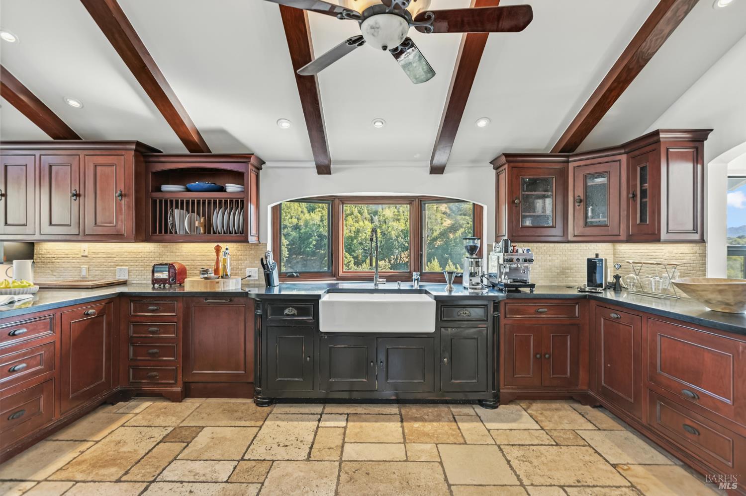 103 Holstein Road San Anselmo, CA 94960 - Photo 18 of 66 a large kitchen with granite countertop a stove a sink dishwasher and cabinets