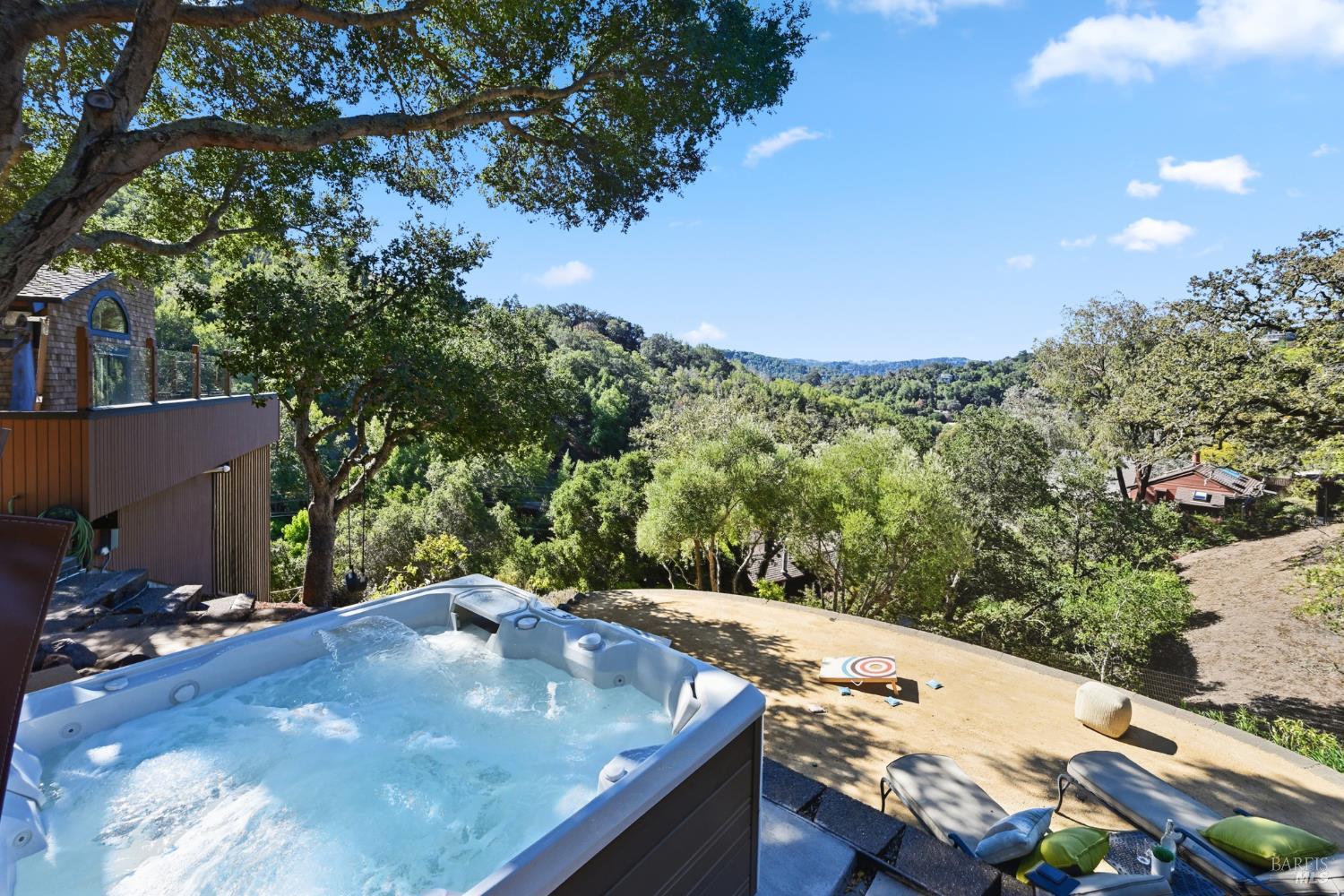 103 Holstein Road San Anselmo, CA 94960 - Photo 2 of 66 a view of a backyard with a table and chairs