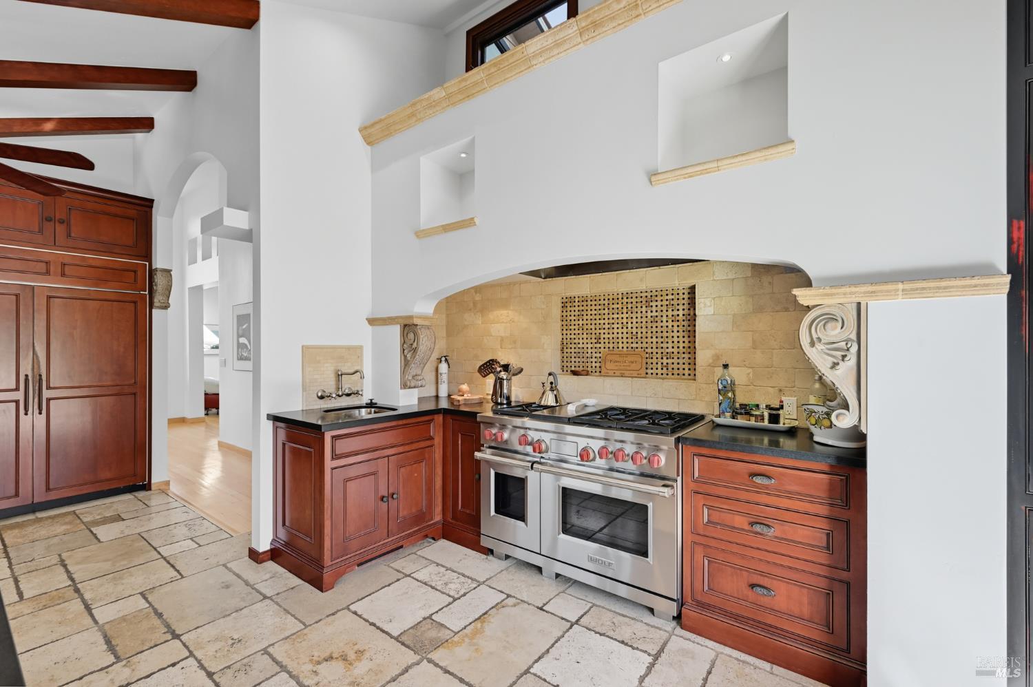 103 Holstein Road San Anselmo, CA 94960 - Photo 25 of 66 a kitchen with stainless steel appliances granite countertop a stove and a refrigerator